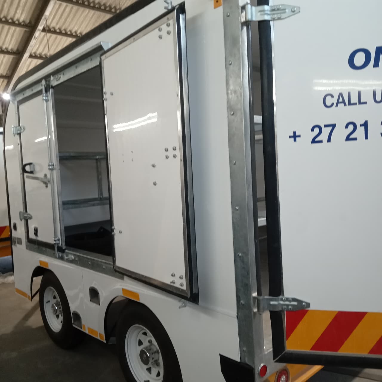 GM Trailers bustrailersside